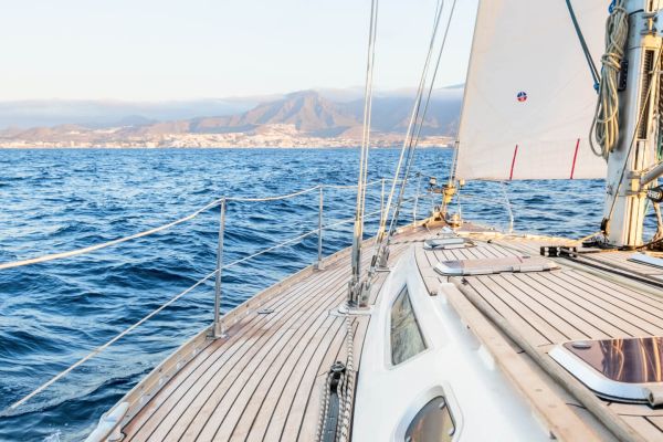 sailing yacht on water in sunset 1 2651b193