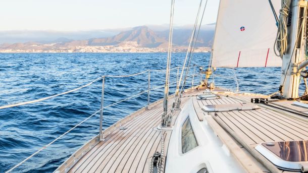 sailing yacht on water in sunset 1 56bf2b6d