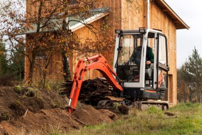 small rental excavator digging trench 7560cce5