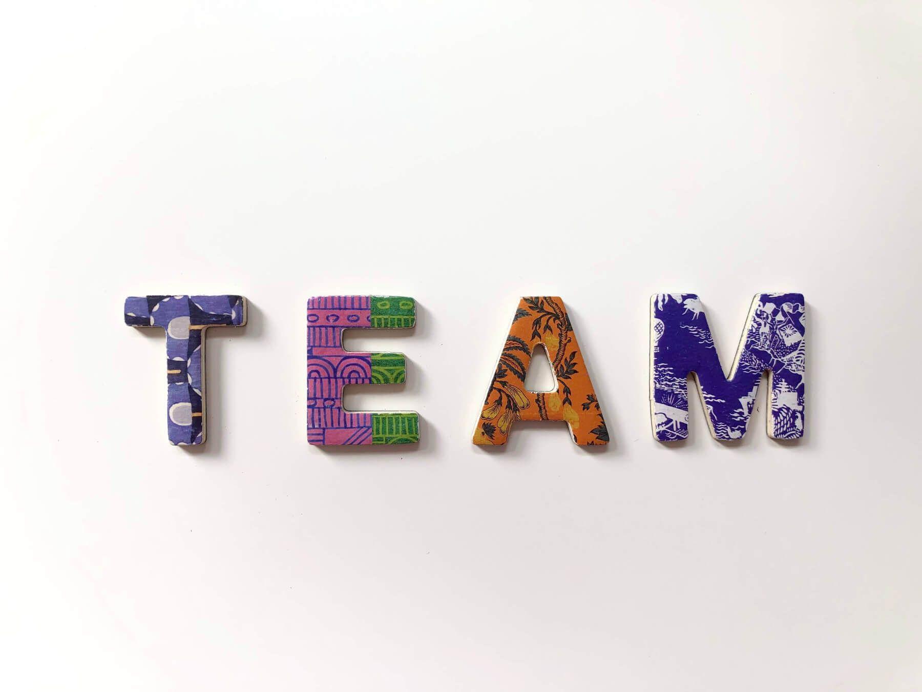 colourful letters forming the word team on white background af2f11a4