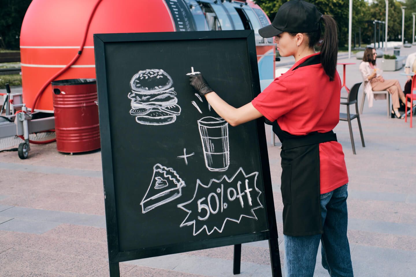 human drawing on chalkboard of fast food offer discount cda2d9e3
